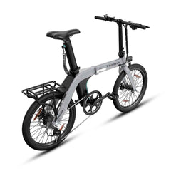 Graues E-Bike City Faltrad mit schwarzem, stabilem Gepäckträger am Heck.