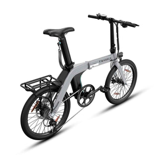 Graues E-Bike City Faltrad mit schwarzem, stabilem Gepäckträger am Heck.